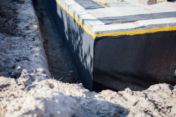 Professional Waterproofing technician working in Keshena, WI